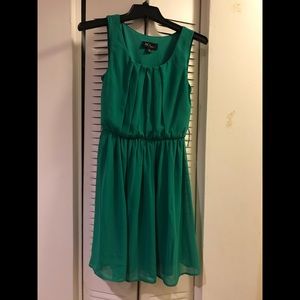 Green pleated A-line dress